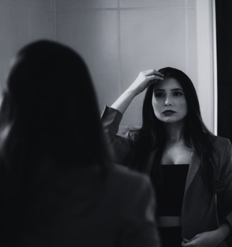 Performative Nervous System Regulation: Why Senior Women Are Losing the Room While Looking Calm